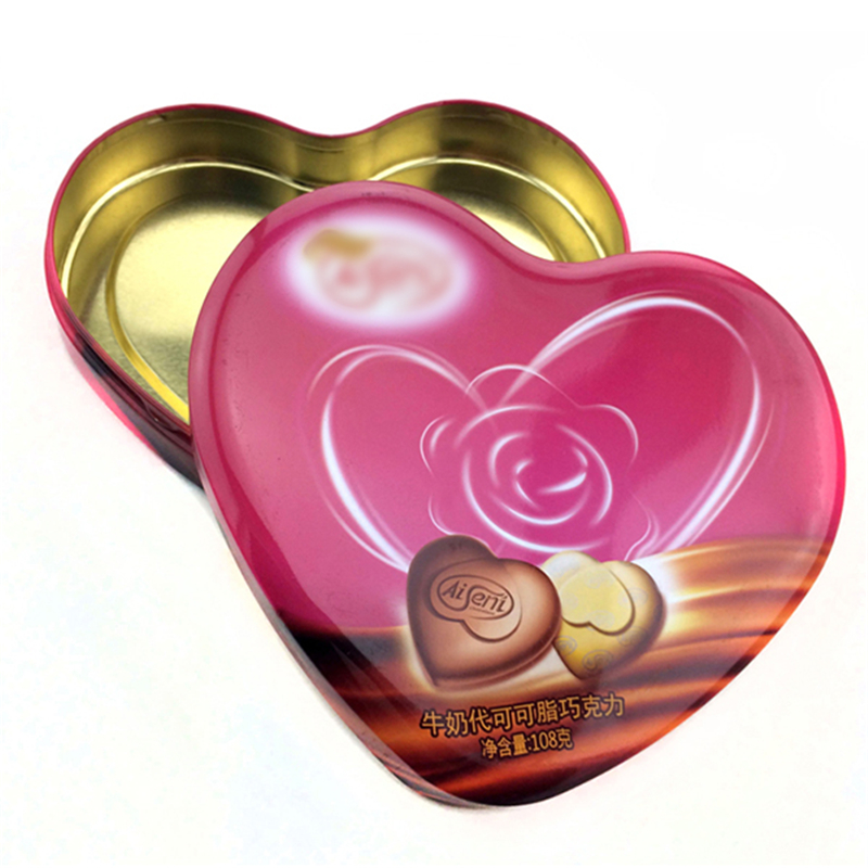 Potravinářská krabička s čokoládovou cukrovinkou ve tvaru srdce